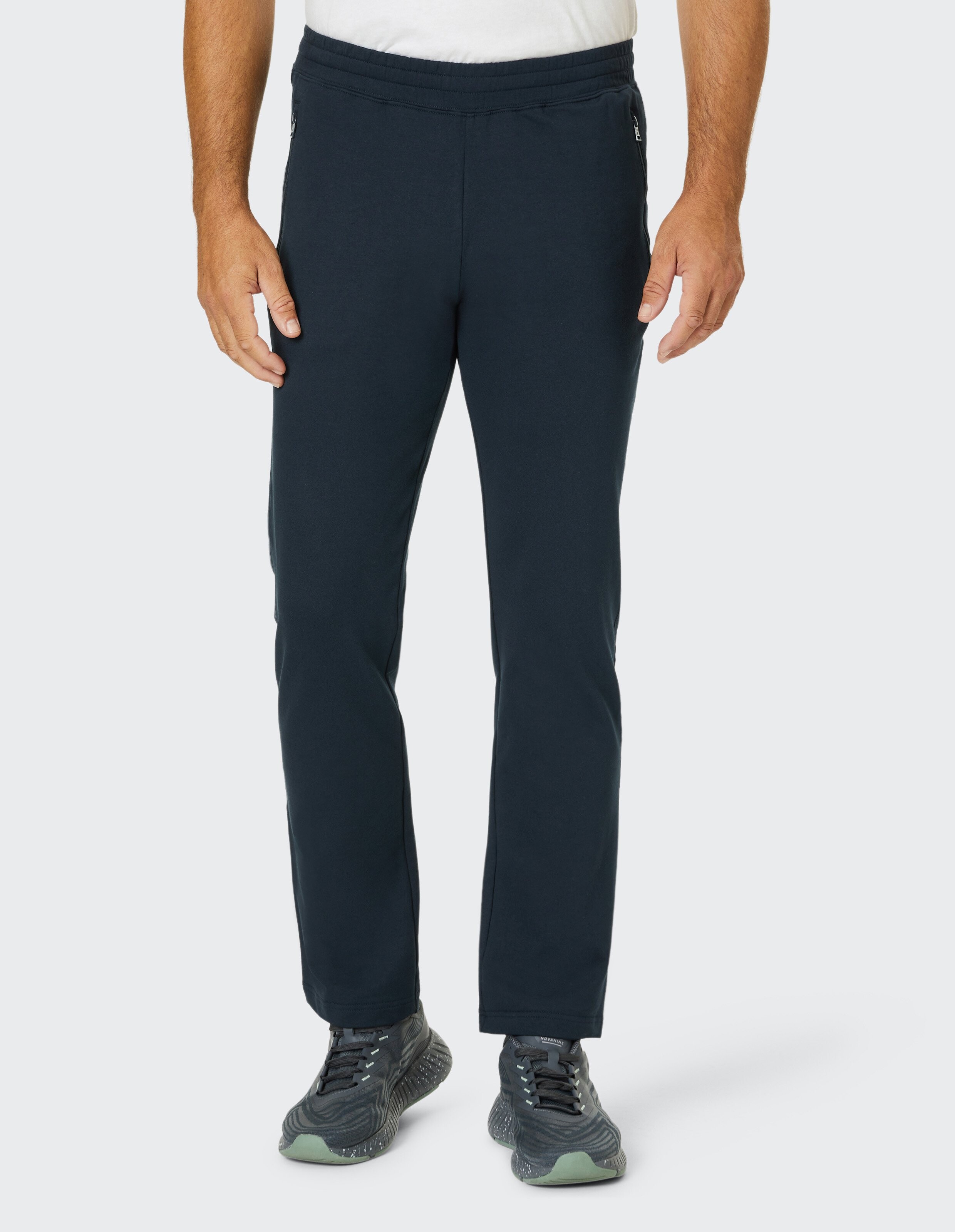 Dunkelblaue Jogginghose mit elastischem Bund, geradem Schnitt und minimalistischen Design, ideal für Freizeit und Sport.