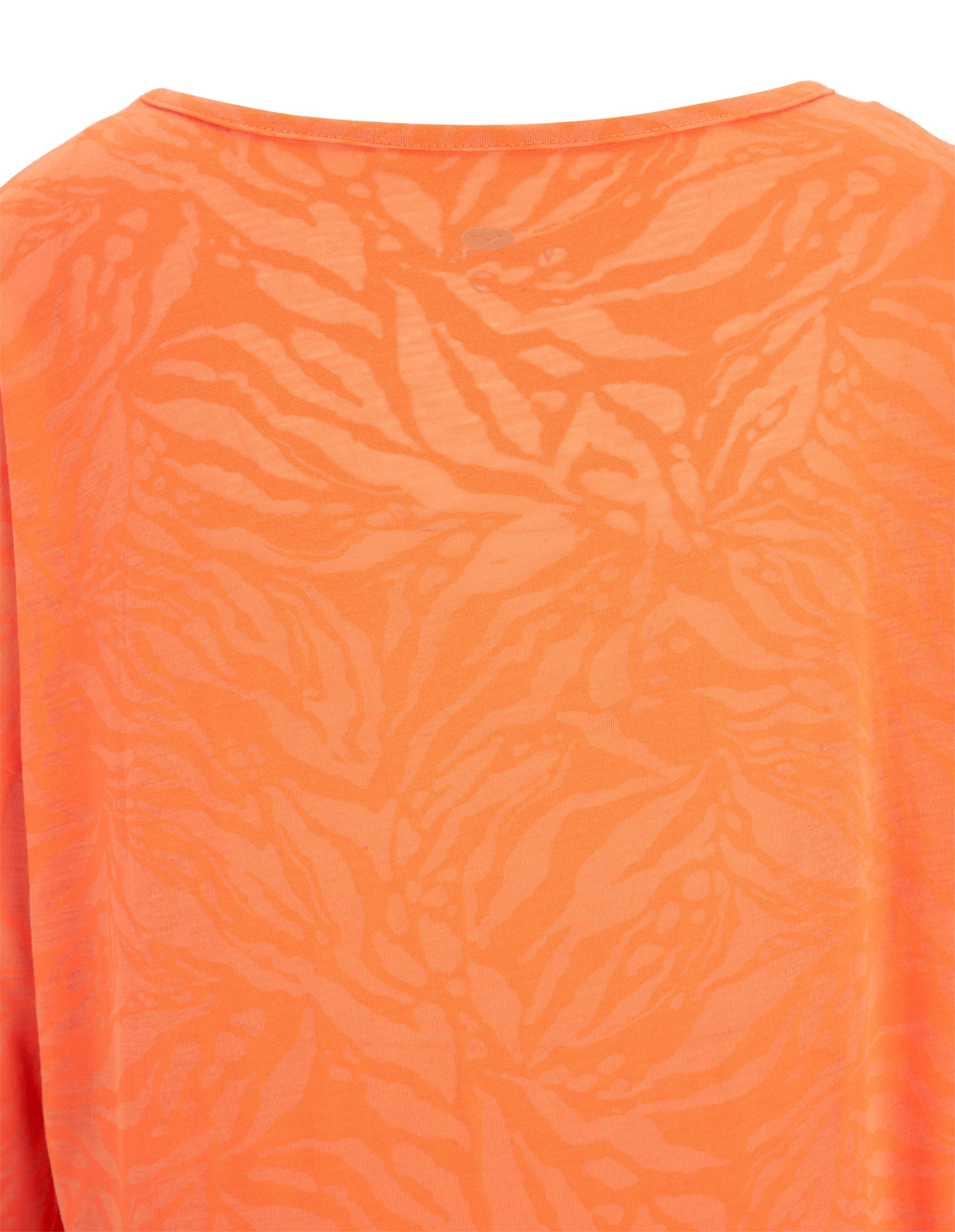 Orangefarbenes Freizeit-T-Shirt mit dezentem, farblich abgestimmtem Zebramuster für bequeme Loungewear.