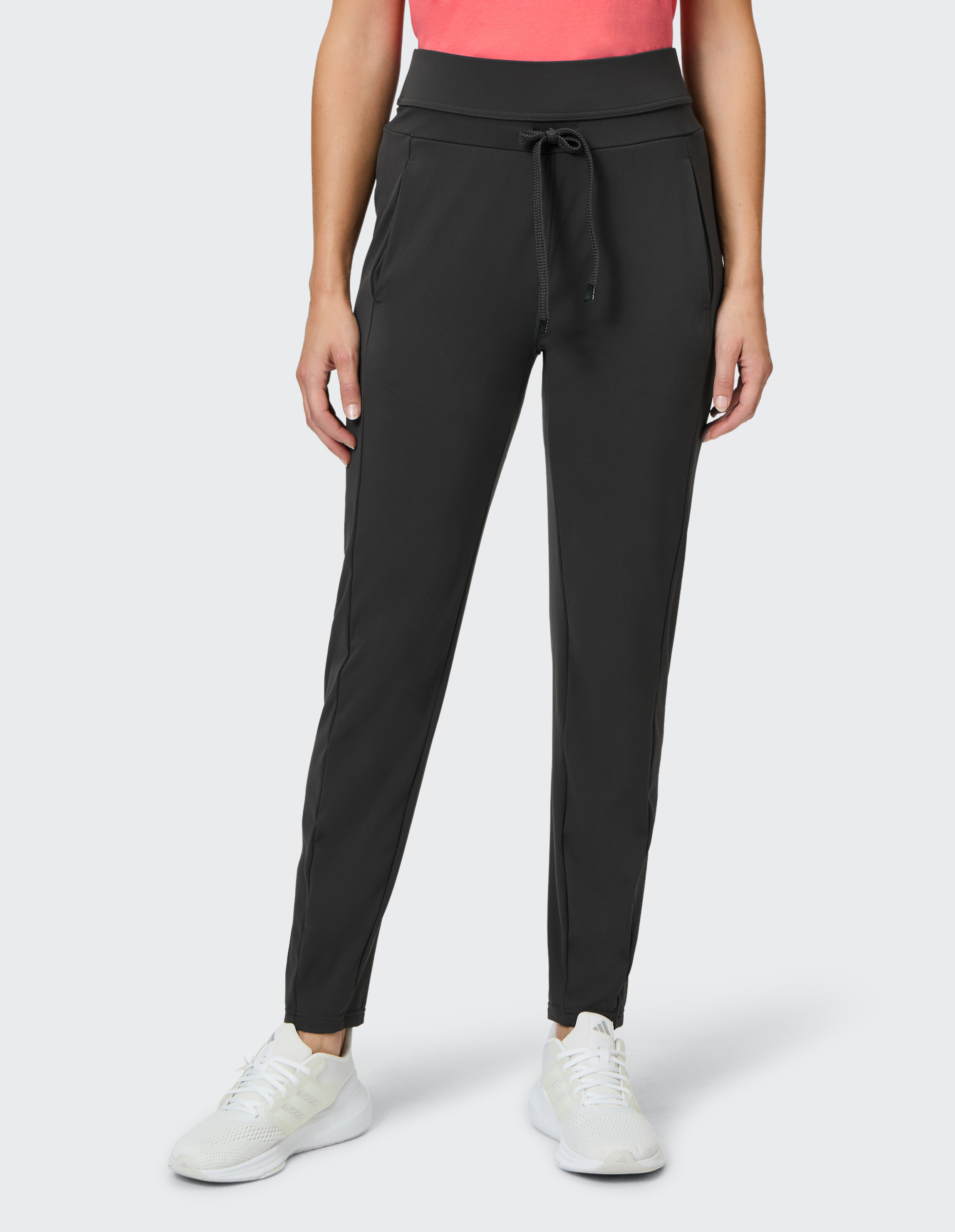 Schwarze Damen-Jogginghose mit Kordelzug in der Taille und Seitentaschen, perfekt für Freizeitkleidung.