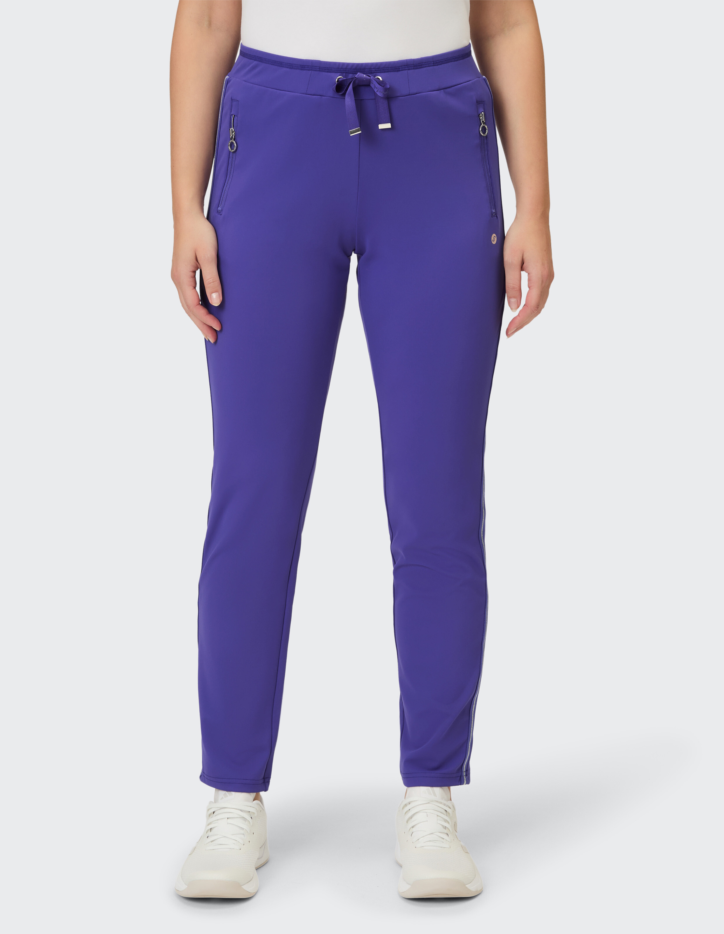 Lila Freizeithose für Damen mit Reißverschlusstaschen und Kordelzug in der Taille, perfekt zum Entspannen.