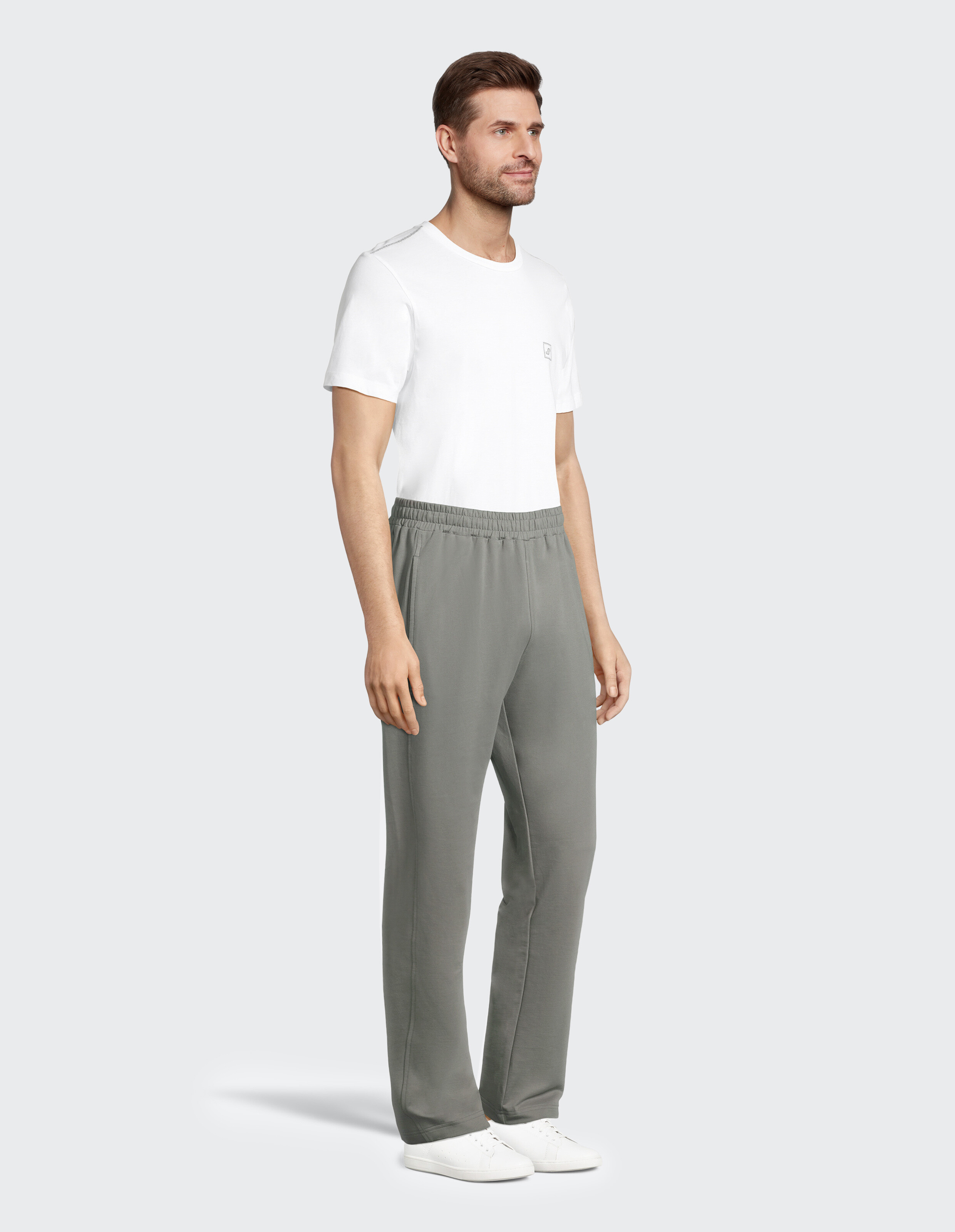 Graue Jogginghose mit elastischem Bund und geradem Schnitt, die aus einem weichen Stoff gefertigt ist und sich für Sport eignet.