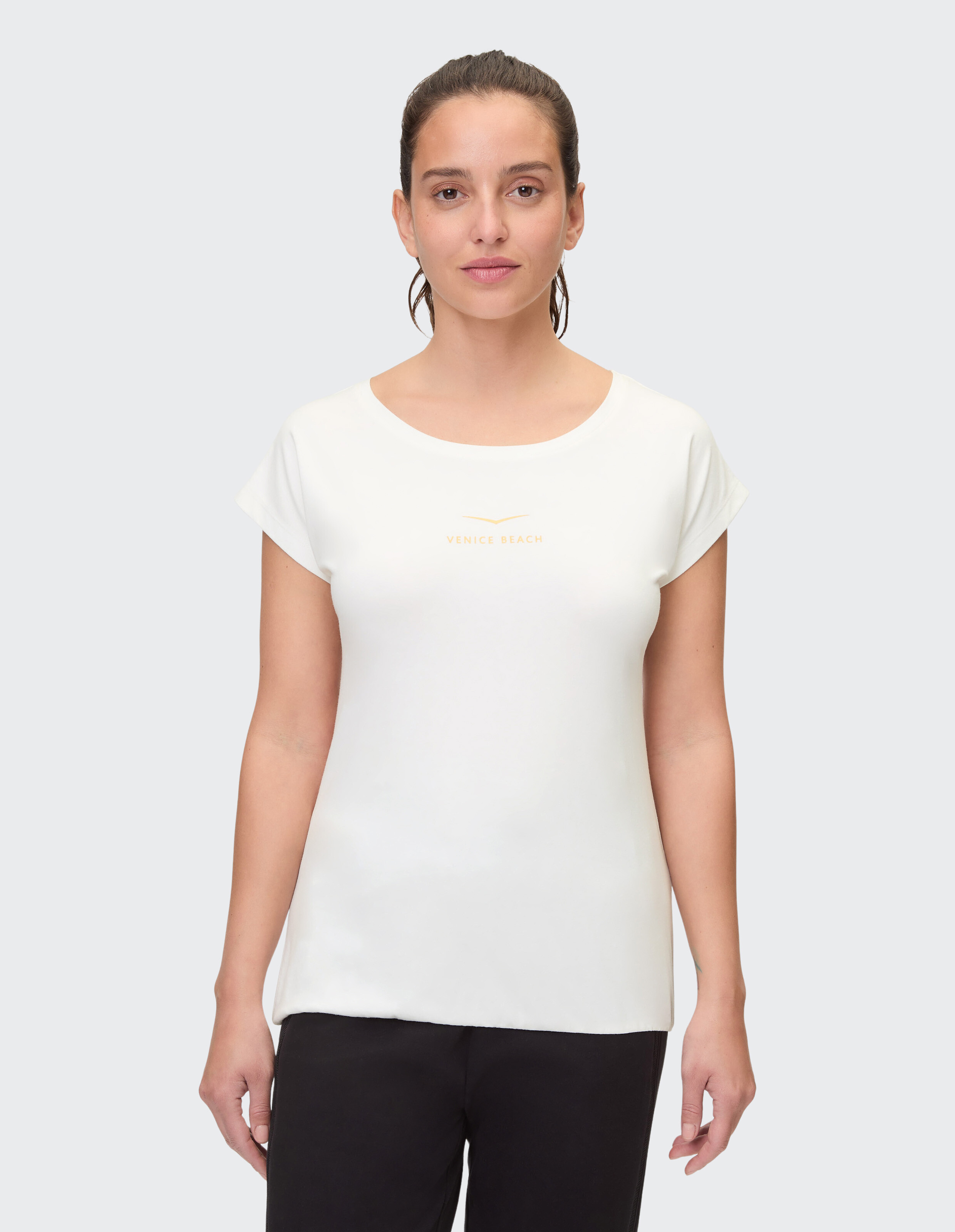 Weißes Freizeitoberteil für Damen mit „Venice Beach“-Aufdruck, perfekt für entspannte Ausflüge.