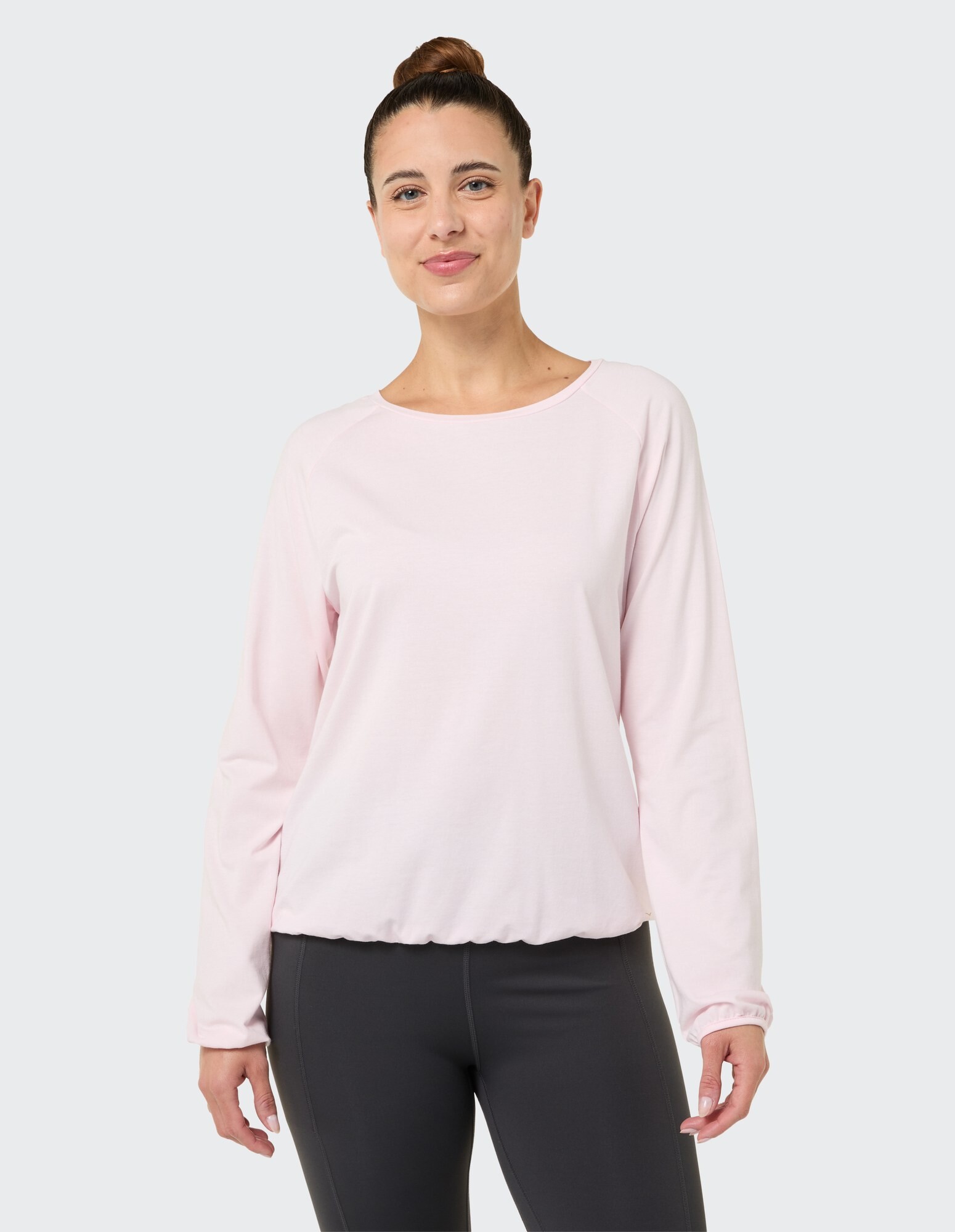 Hellrosa Langarm-Top mit entspannter Passform, perfekt für den Freizeitlook.