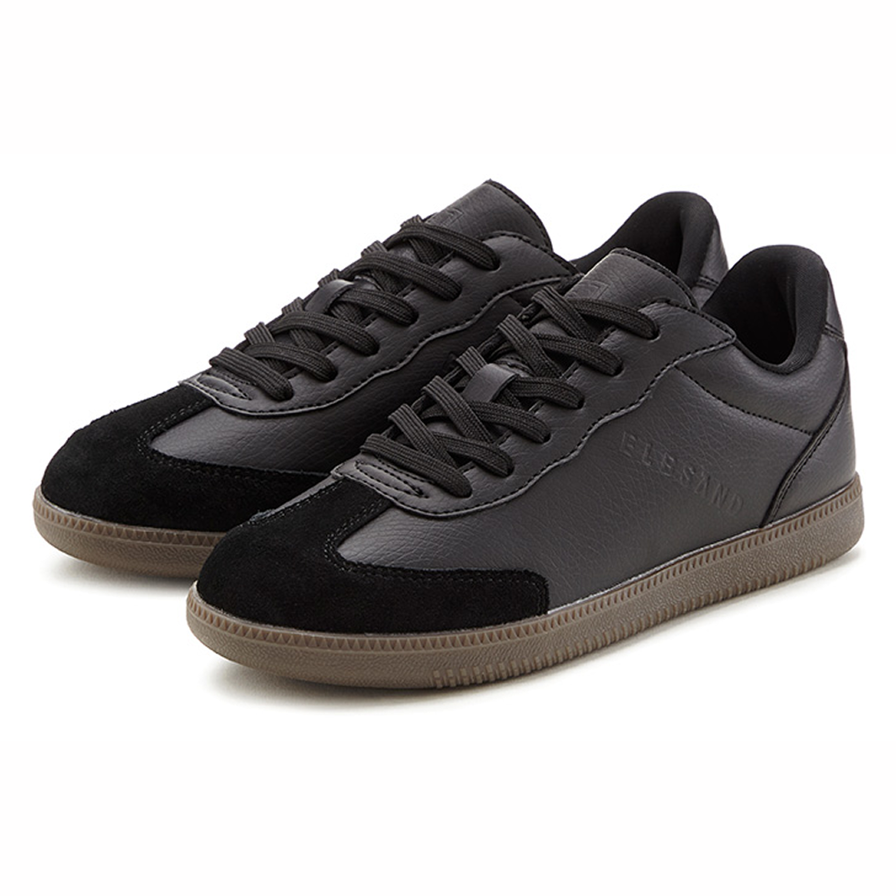 Stylische schwarze Freizeit-Sneaker mit Leder- und Wildlederdetails.