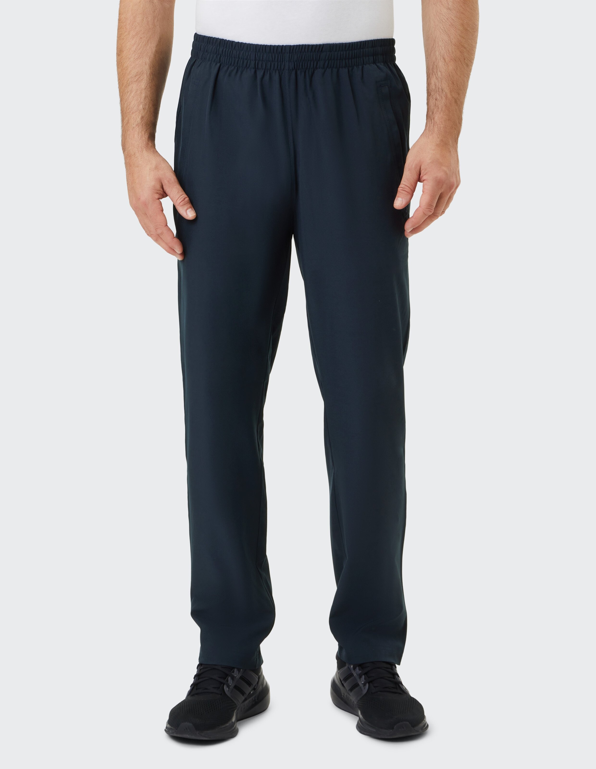 Dunkelblaue, locker sitzende Hose aus weichem Stoff mit elastischem Bund, knitterfrei und knöchellang, für einen lässigen Look.