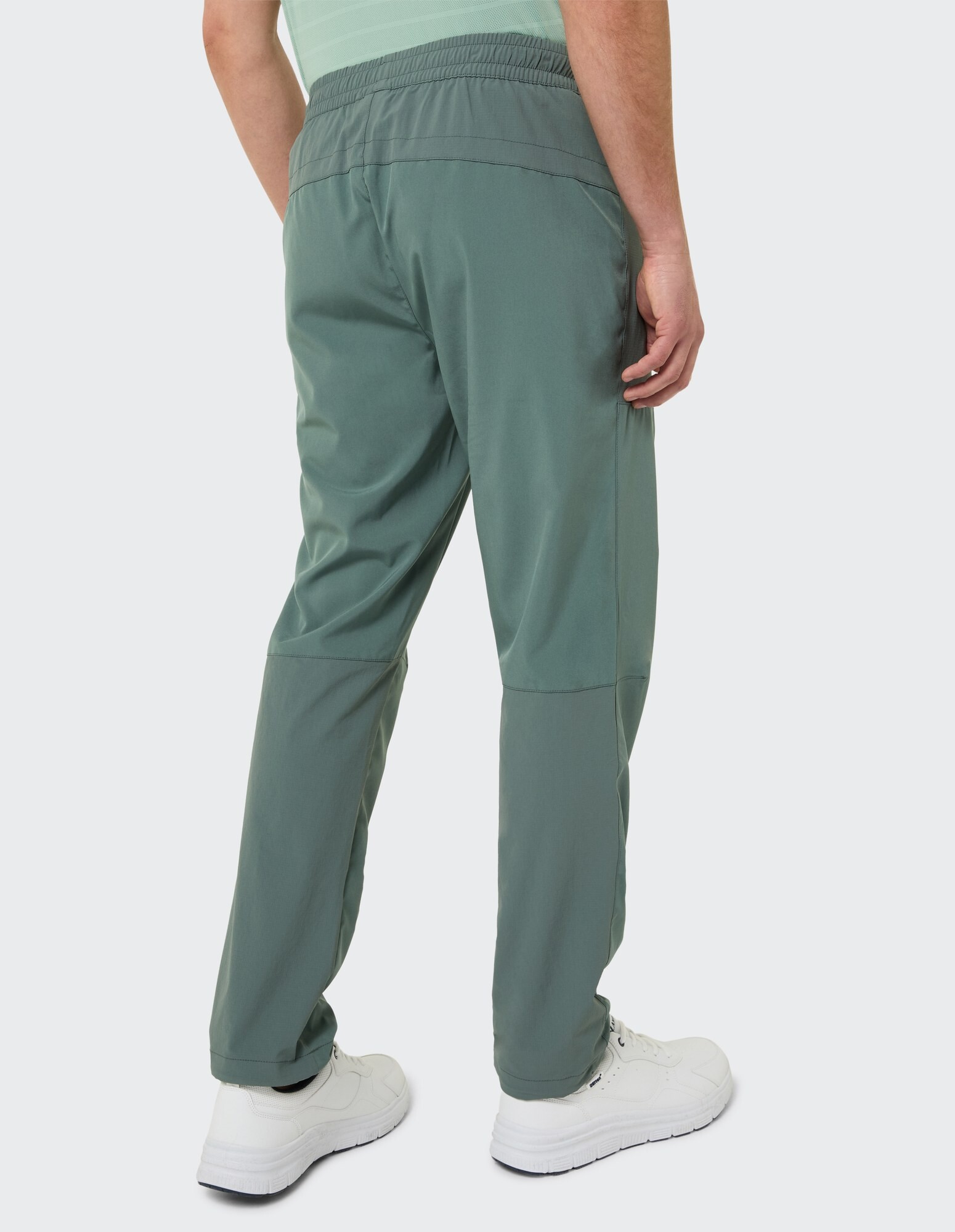 Grüne Freizeithose für Herren mit elastischem Bund, perfekt zum Faulenzen oder Reisen.