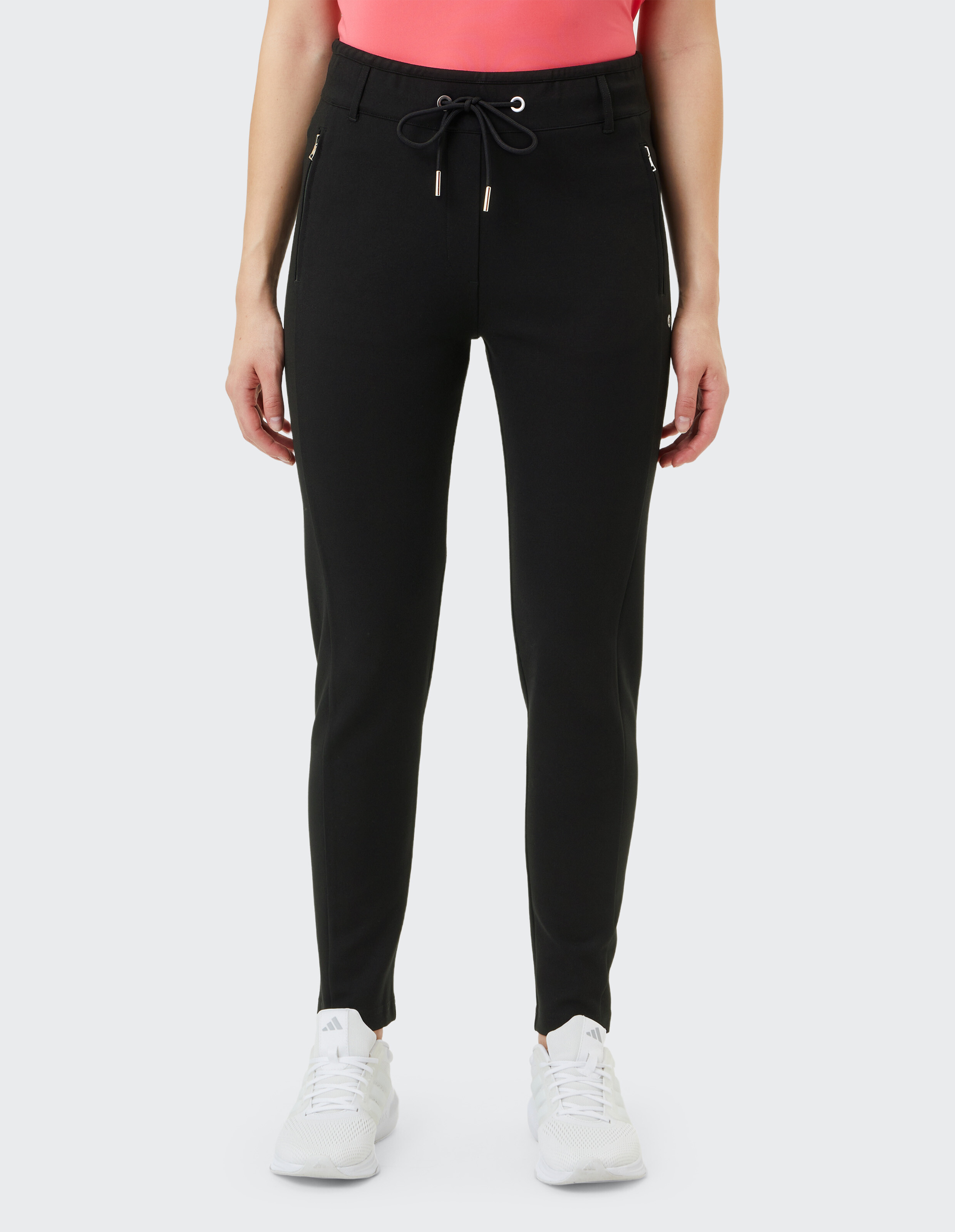 Schwarze Jogginghose mit Tunnelzug und zwei Taschen, schmal geschnitten, perfekt für Freizeit oder sportliche Aktivitäten.