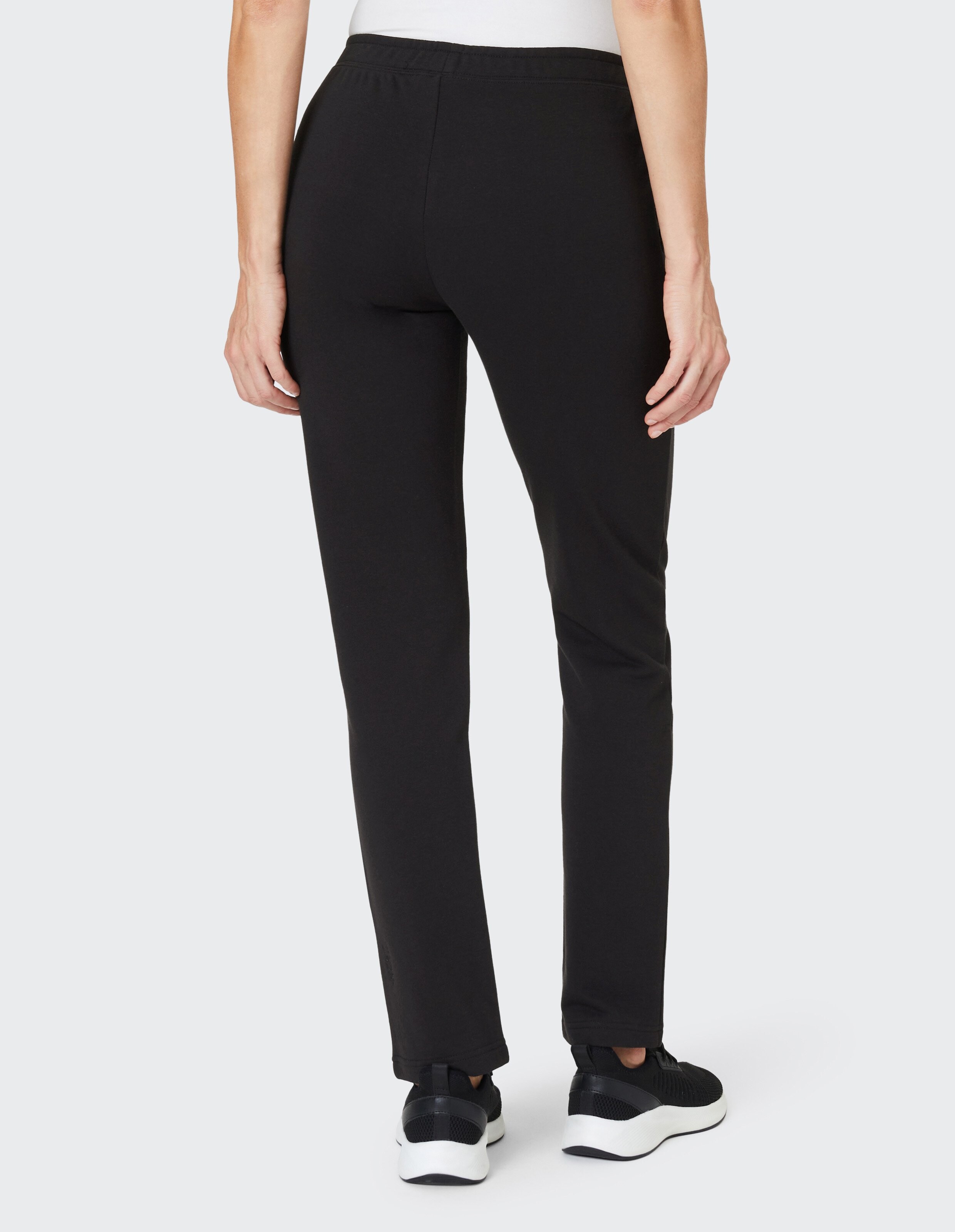 Schwarze, gerade geschnittene Hose aus weichem Stoff mit elastischem Bund und schlichtem Design, ohne sichtbare Taschen oder Details.