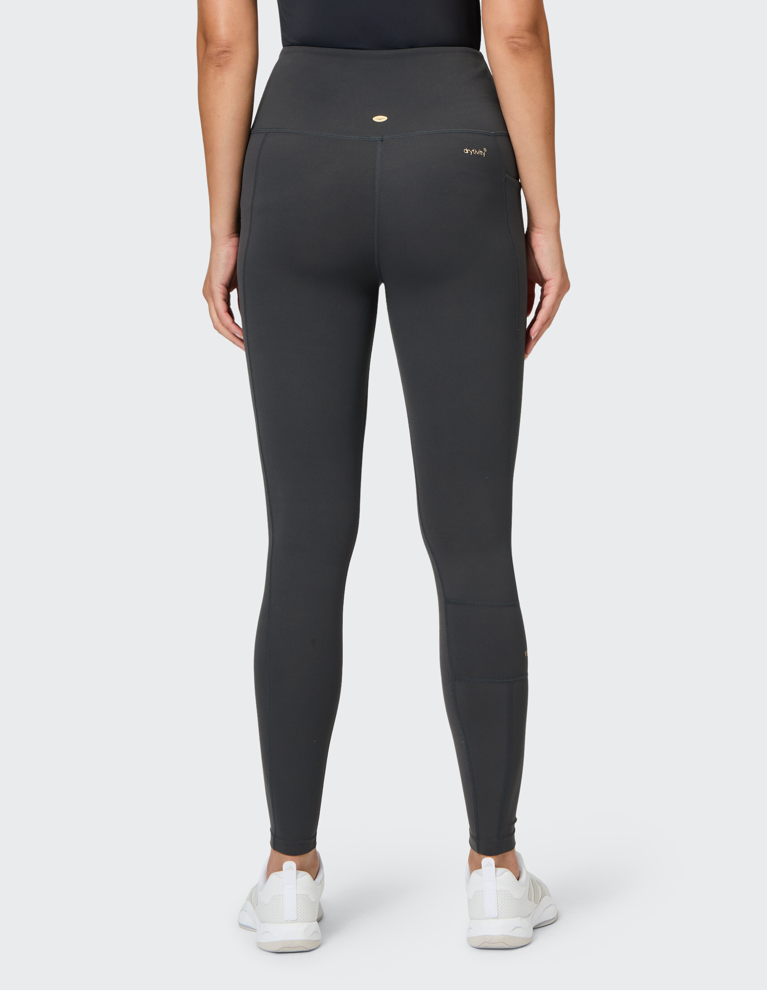 Rückansicht einer dunkelgrauen Leggings mit hoher Taille, perfekt für Freizeitkleidung.