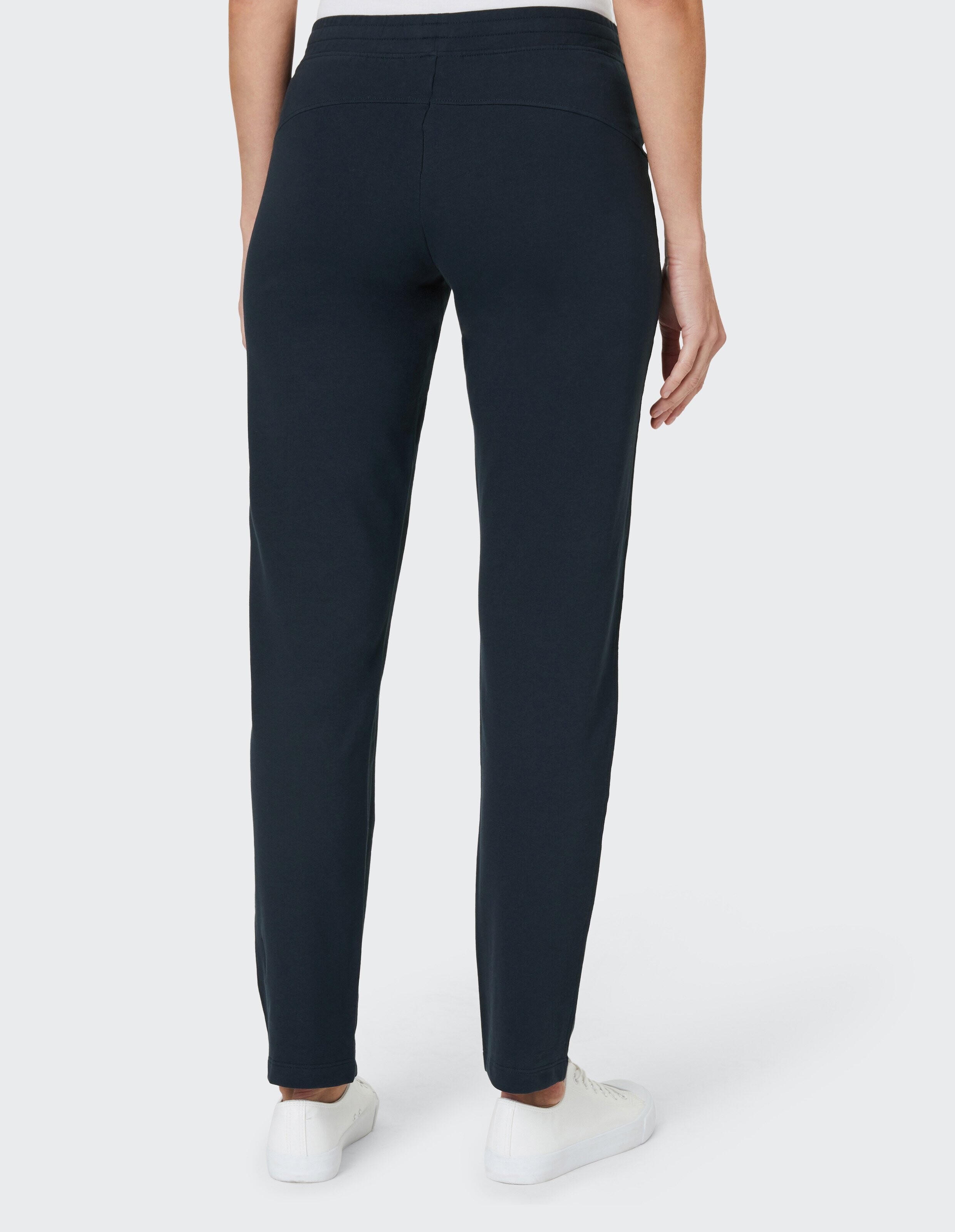 Schwarze Hose mit geradem Schnitt und elastischem Bund, ohne auffällige Details oder Taschen, frontal abgebildet.