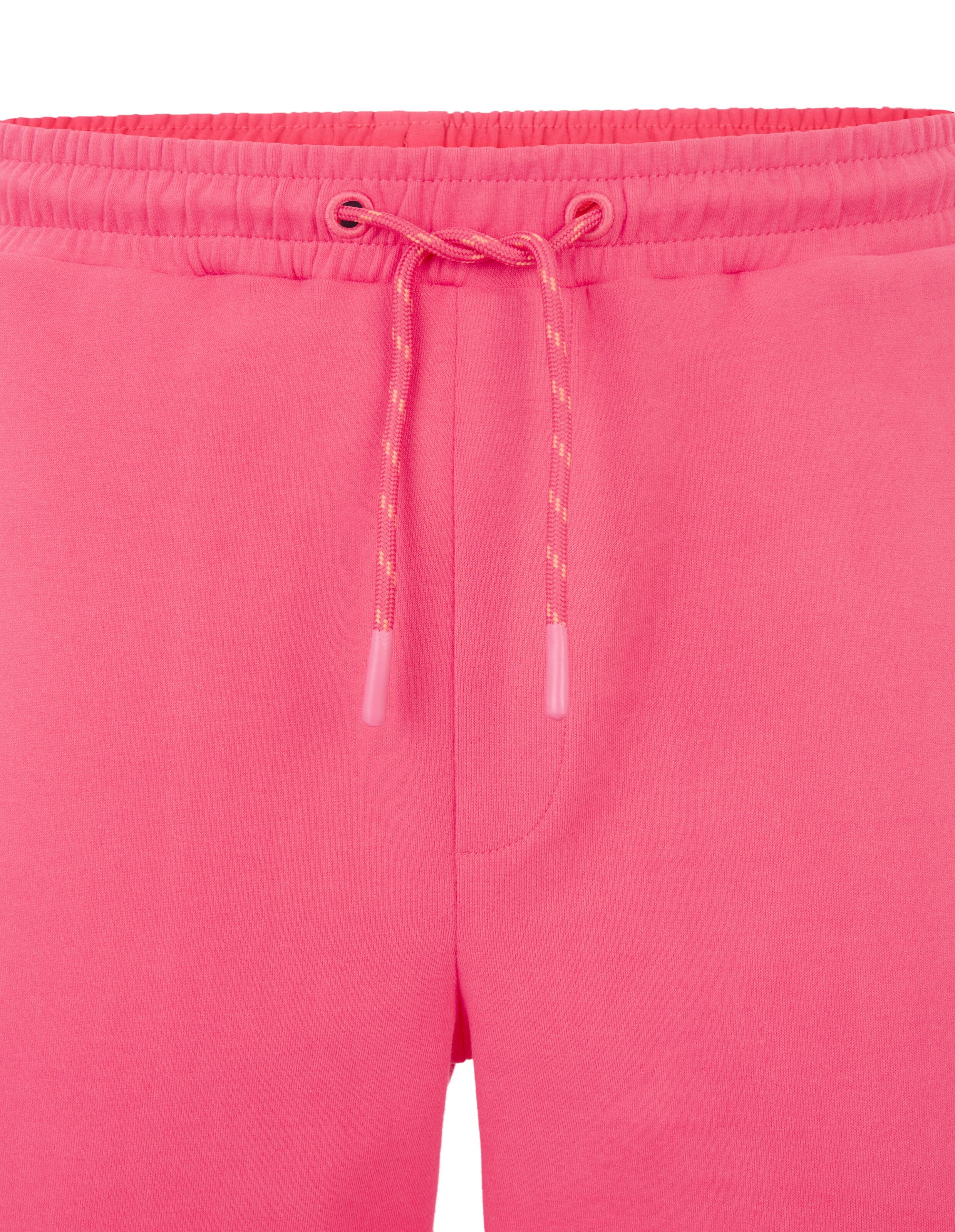 Nahaufnahme einer lässigen Lounge-Jogginghose in leuchtendem Rosa mit elastischem Kordelzugbund.