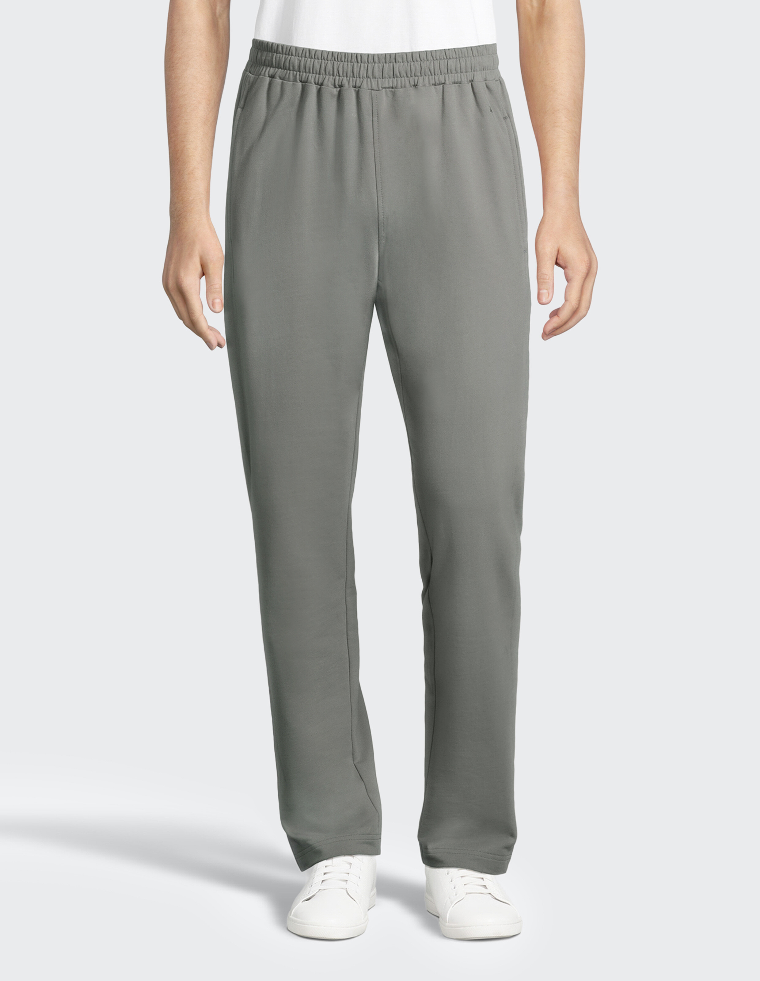 Graue Jogginghose mit elastischem Bund und geradem Schnitt, die aus einem weichen Stoff gefertigt ist und sich für Sport eignet.