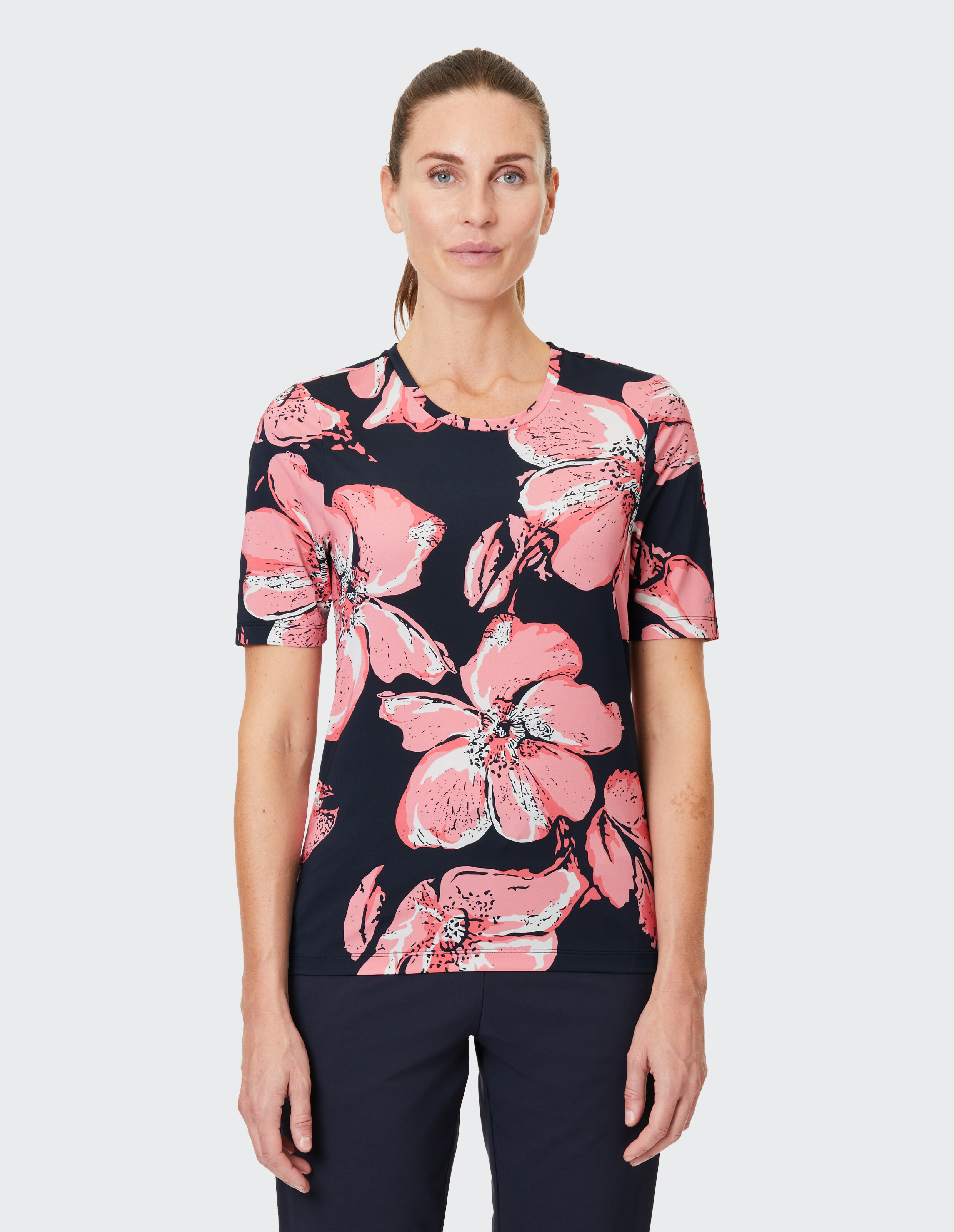 Kurzarm-Top mit Blumendruck in Marineblau mit rosa Blumen, perfekt für Freizeitkleidung.