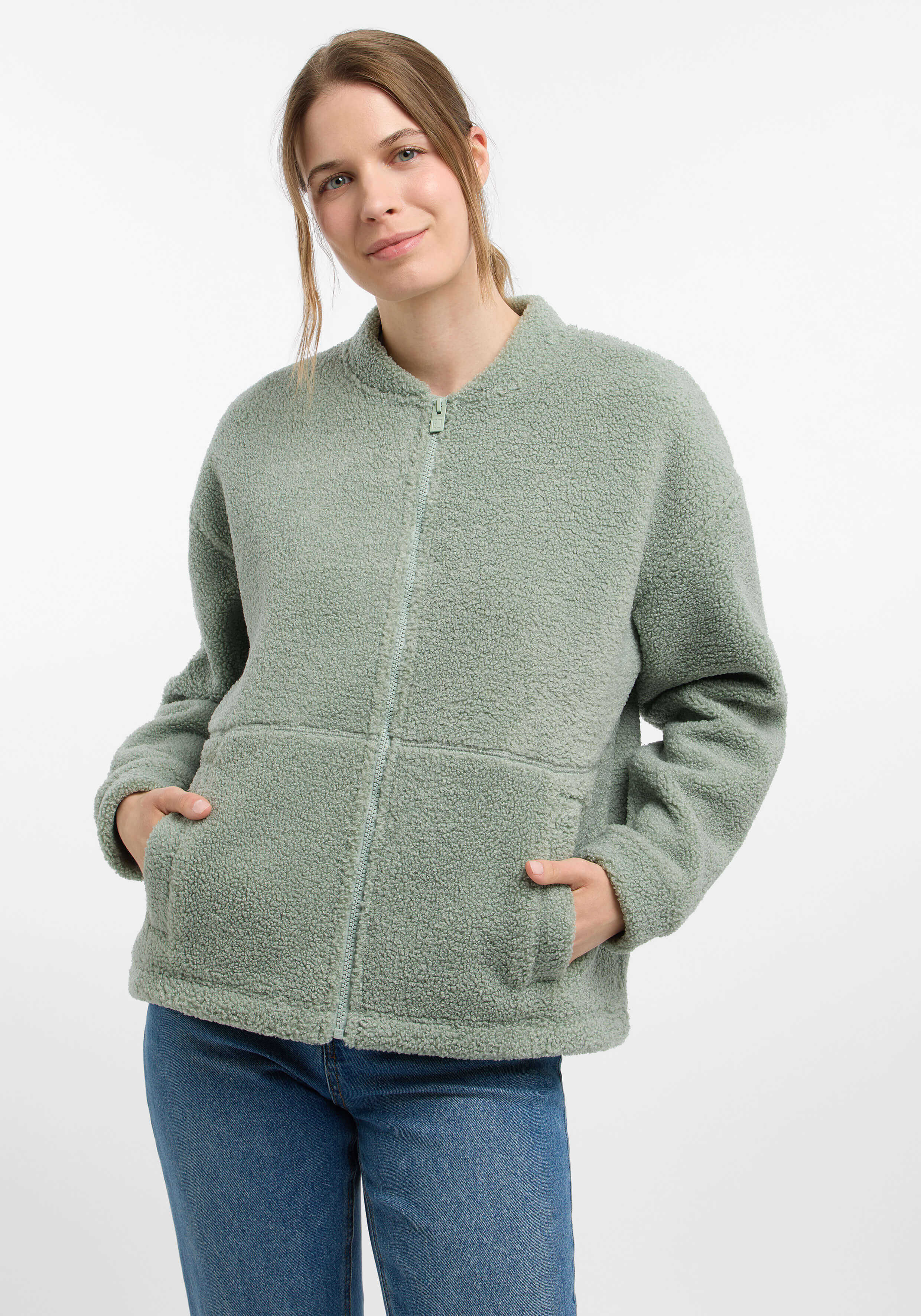 Kuschelige grüne Fleecejacke mit Taschen, perfekt für den Freizeitgebrauch.