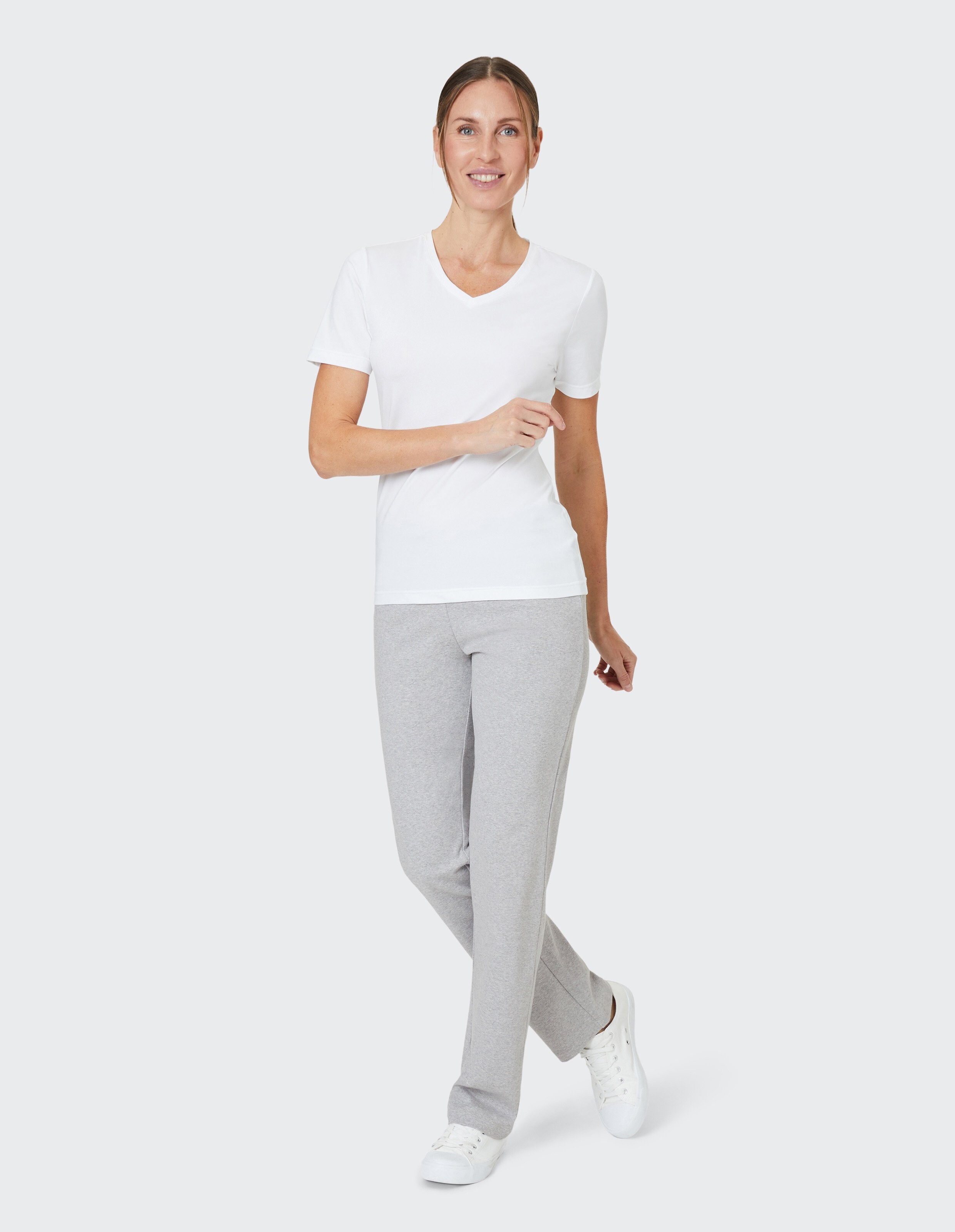 Graue Jogginghose mit Kordelzug am Bund, gerade geschnitten, aus weichem Stoff, ideal für Freizeit und Sport.