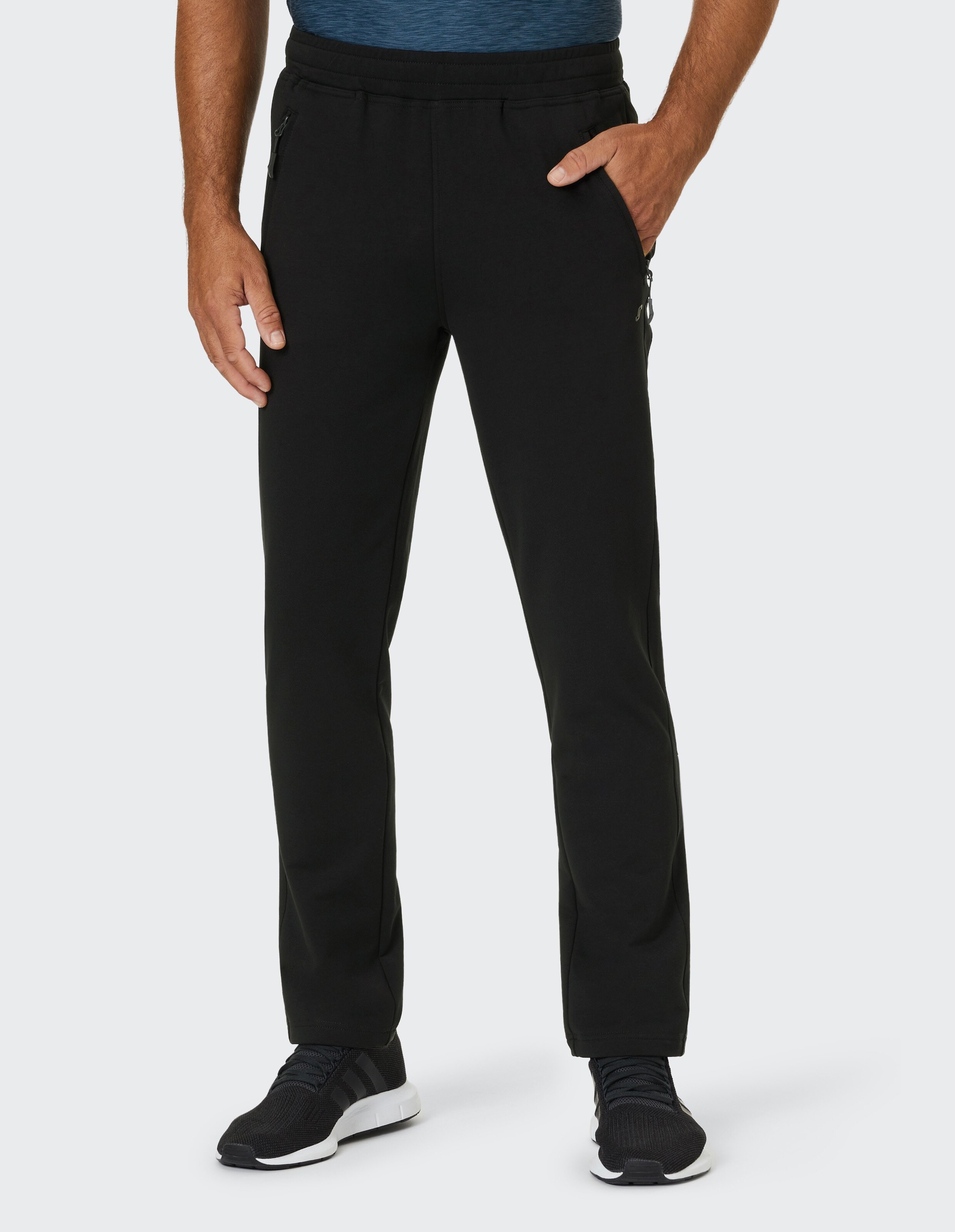 Schwarze Herren-Jogginghose mit Reißverschlusstaschen, perfekt für den Freizeitgebrauch.