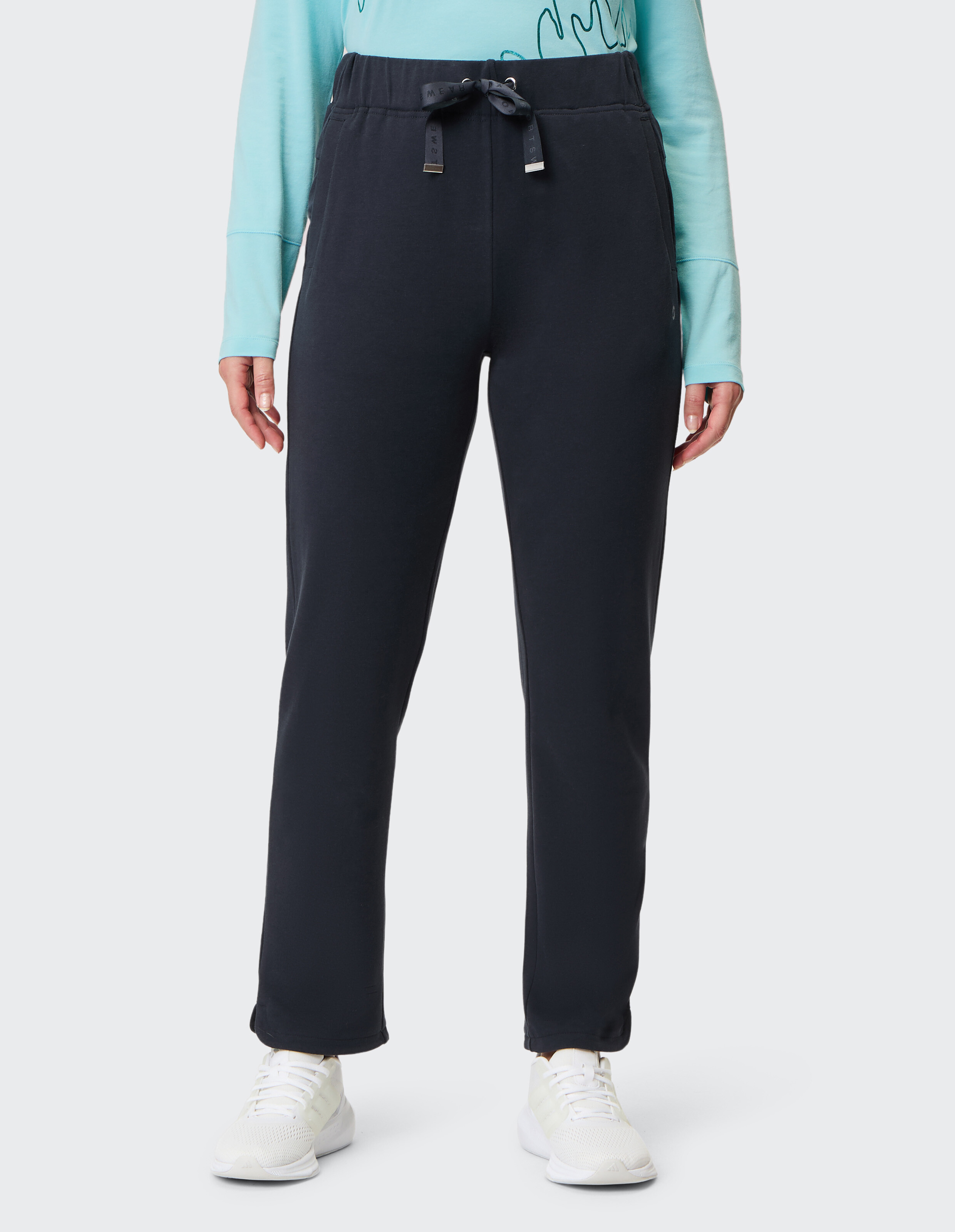 Schwarze Jogginghose mit Tunnelzug und Logoschriftzug. Gerader Schnitt, elastischer Bund, schlichtes Design, ideal für Sport oder Freizeit.