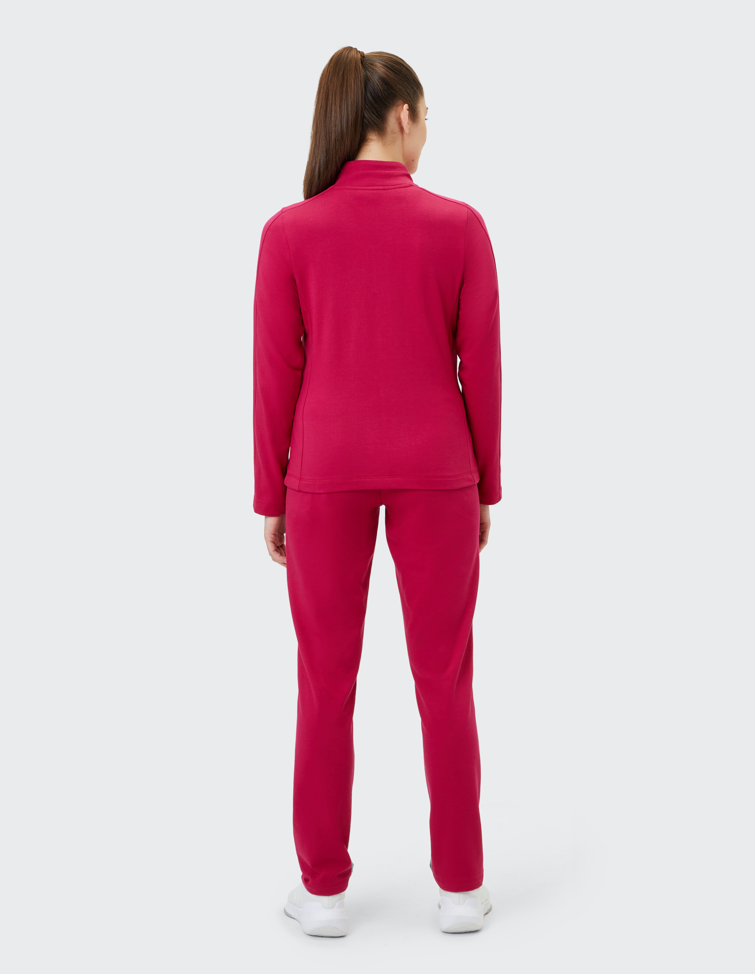 Roter Freizeitanzug mit langen Ärmeln und Reißverschluss an der Jacke, passende lange Hosen, bequemer und schlichter Stil.