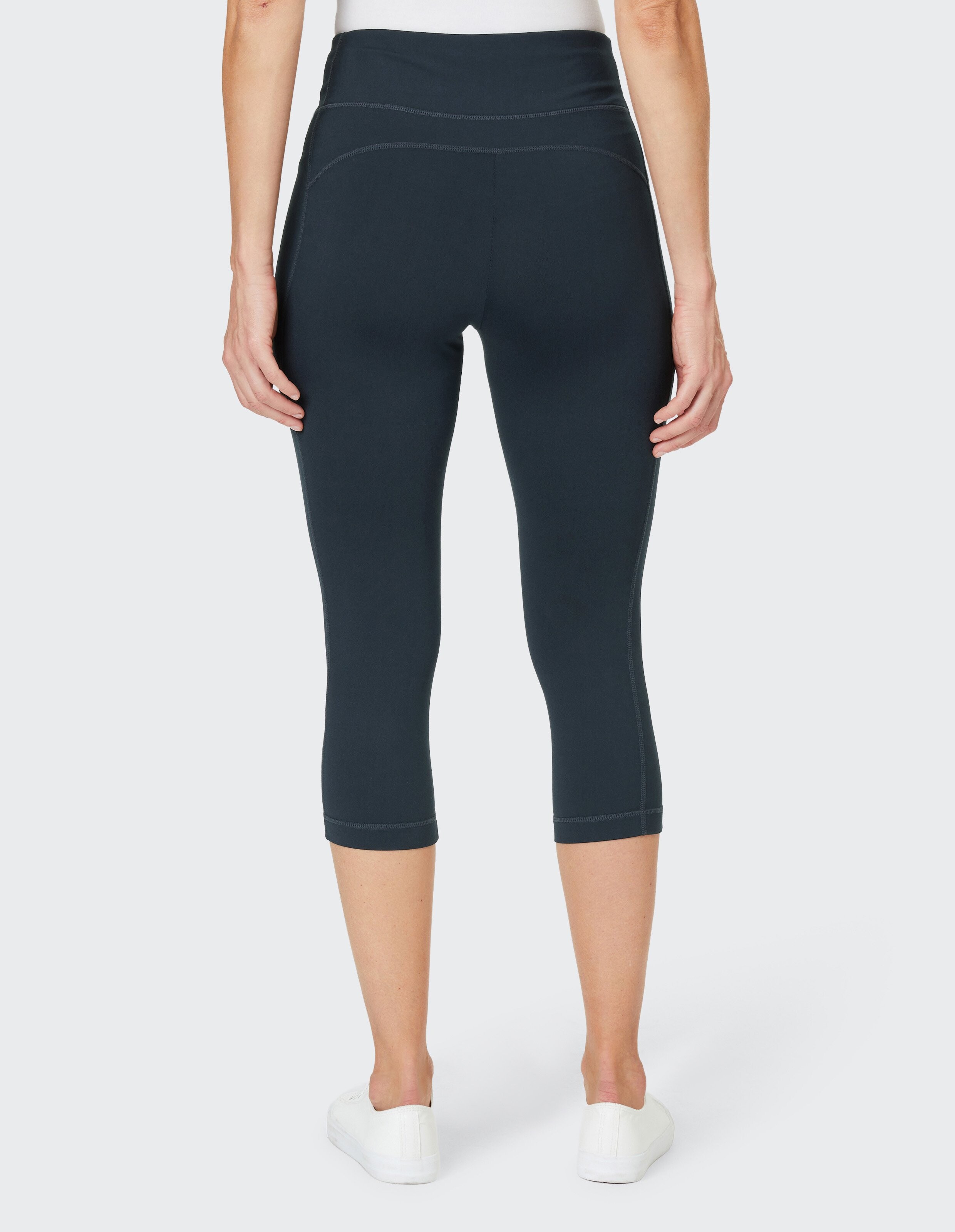 Dunkelblauer, knielanger Sportleggings mit hohem Bund, aus elastischem Stoff, ideal für Fitnessaktivitäten und athletischen Komfort.