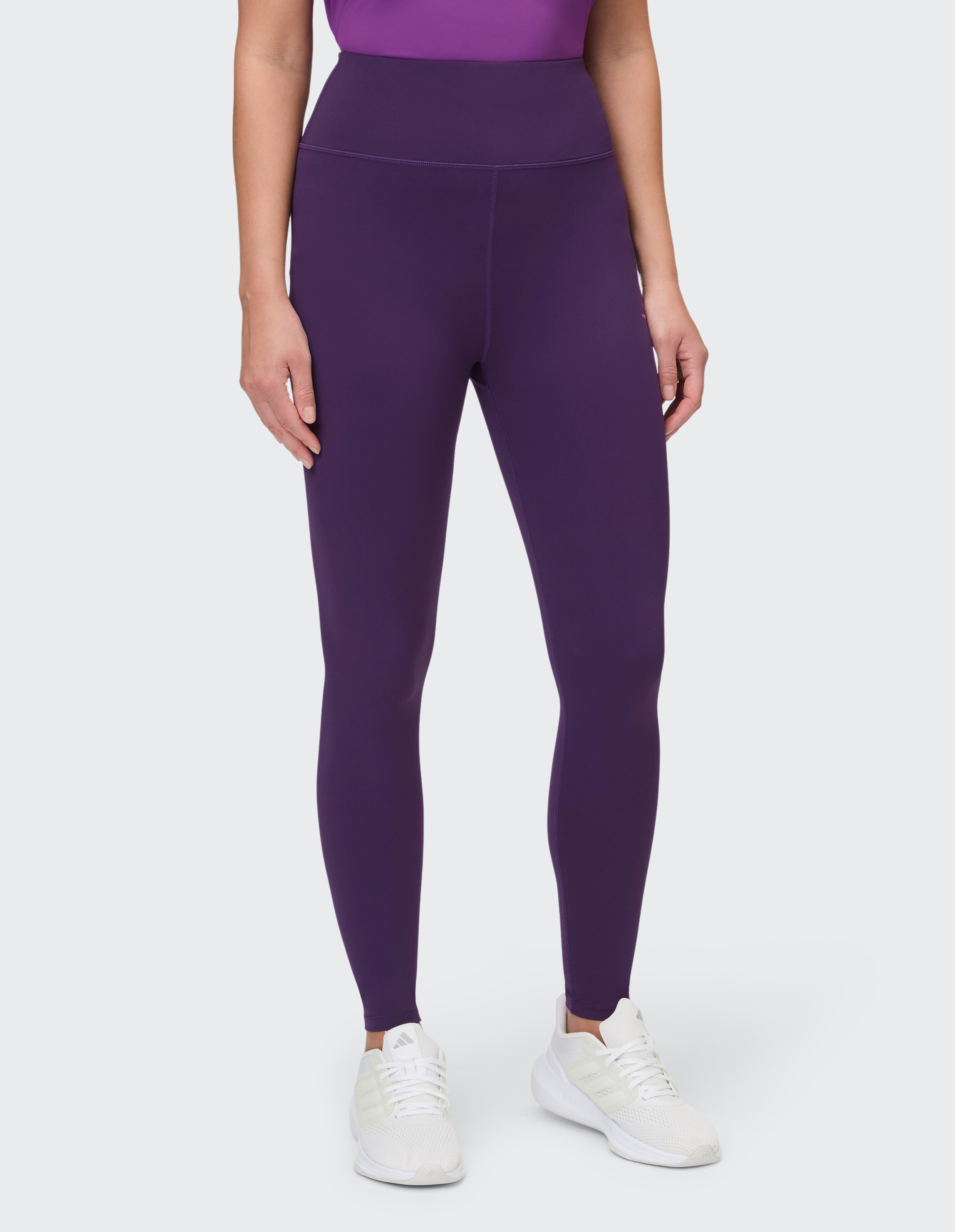 Lila Damen-Leggings mit hoher Taille, perfekt für Freizeitkleidung oder Workouts.