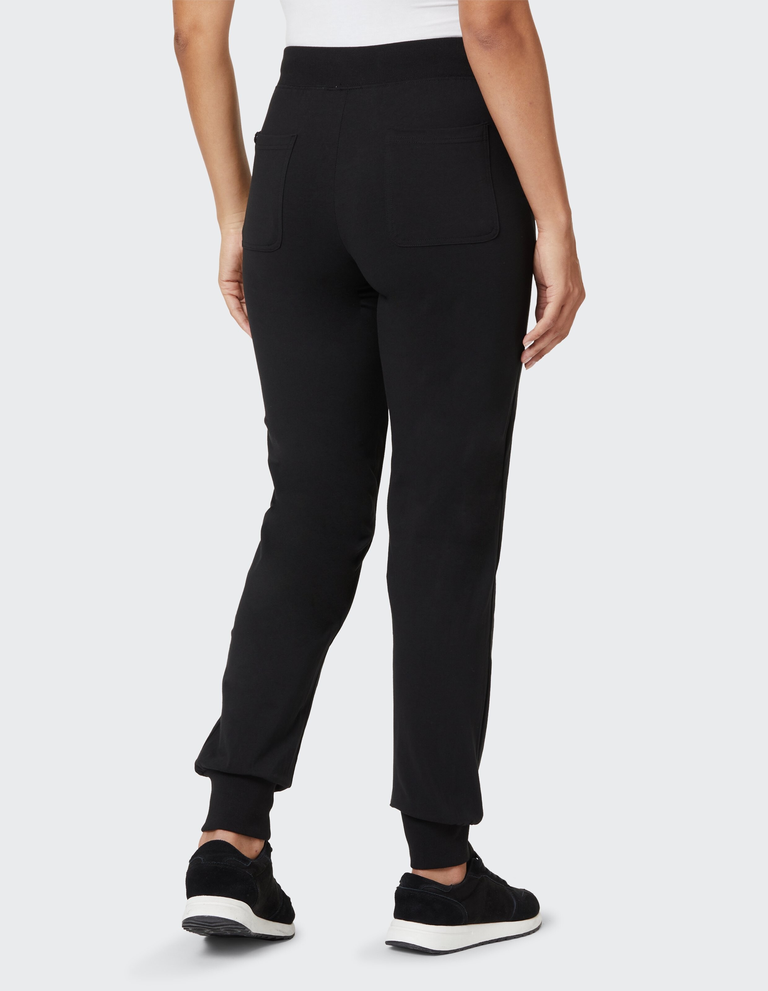 Rückansicht der schwarzen Jogginghose „Venice Beach Valley Tor“ mit gerippten Bündchen.