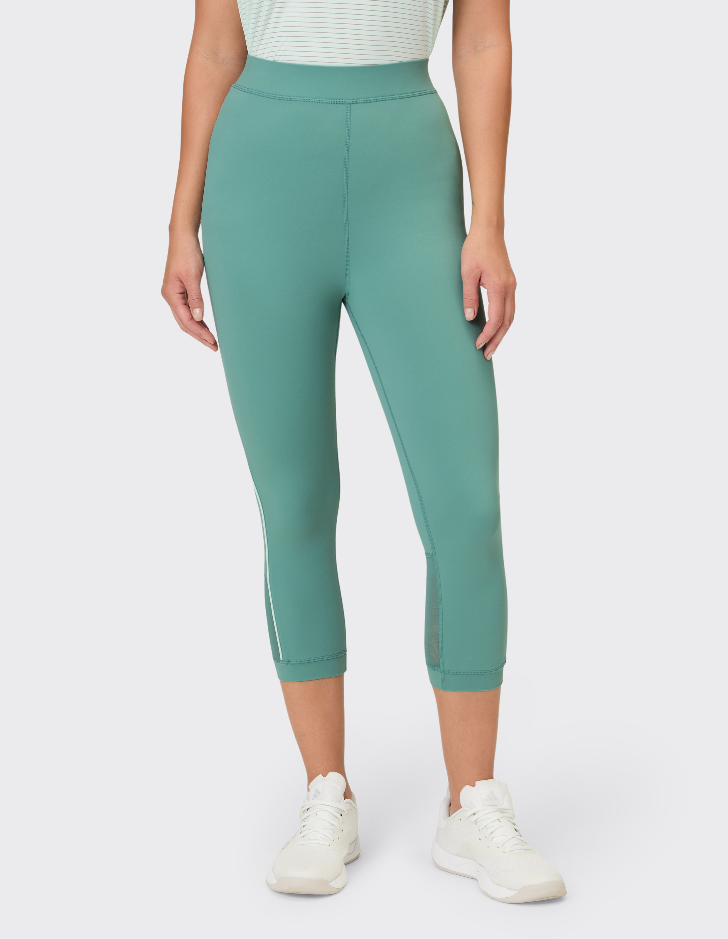 Blaugrüne Capri-Leggings für Damen mit Mesh-Details, perfekt für Freizeitkleidung.
