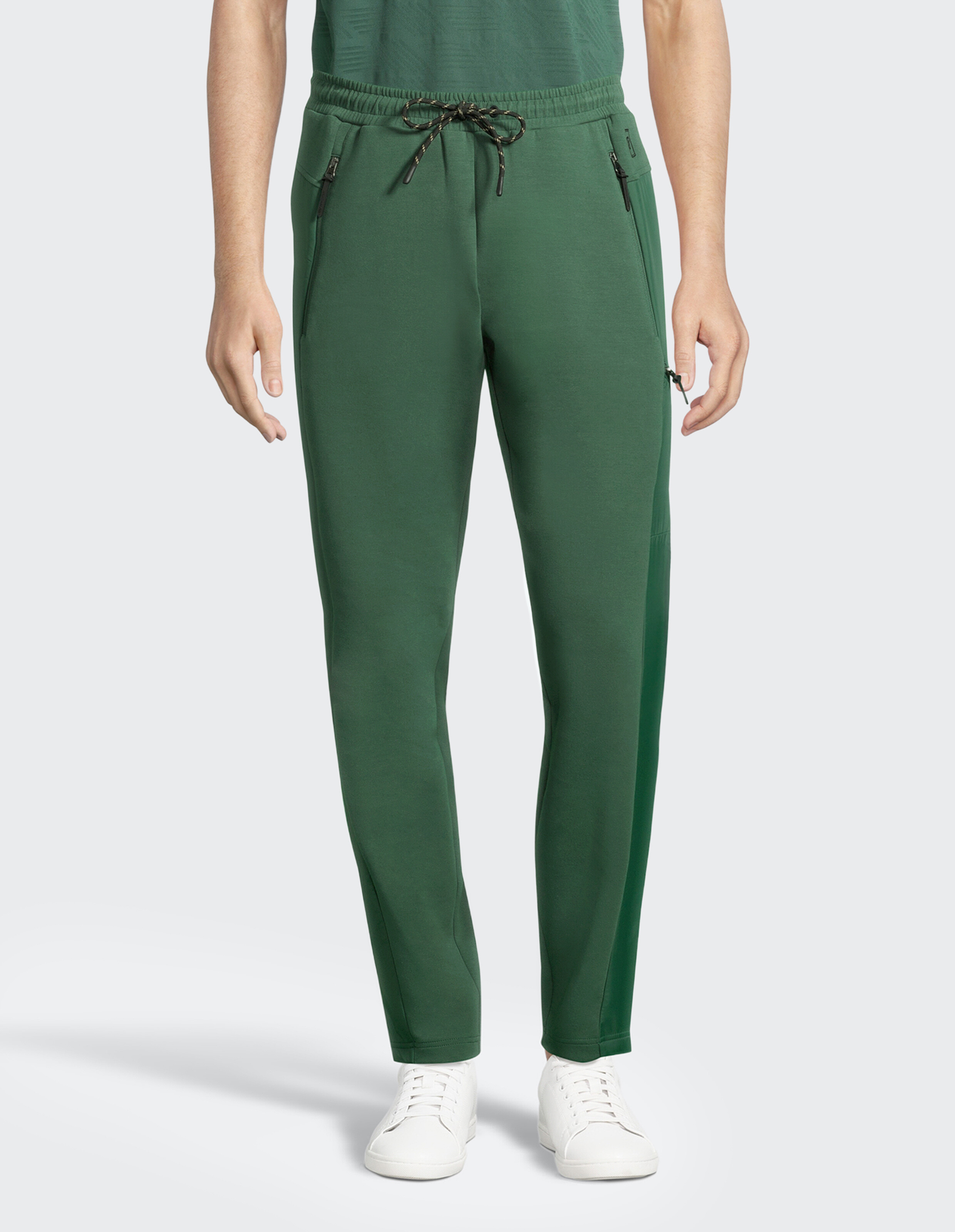 Grüne Herren-Jogginghose mit Kordelzug und Reißverschlusstaschen, perfekt für den Freizeitgebrauch.