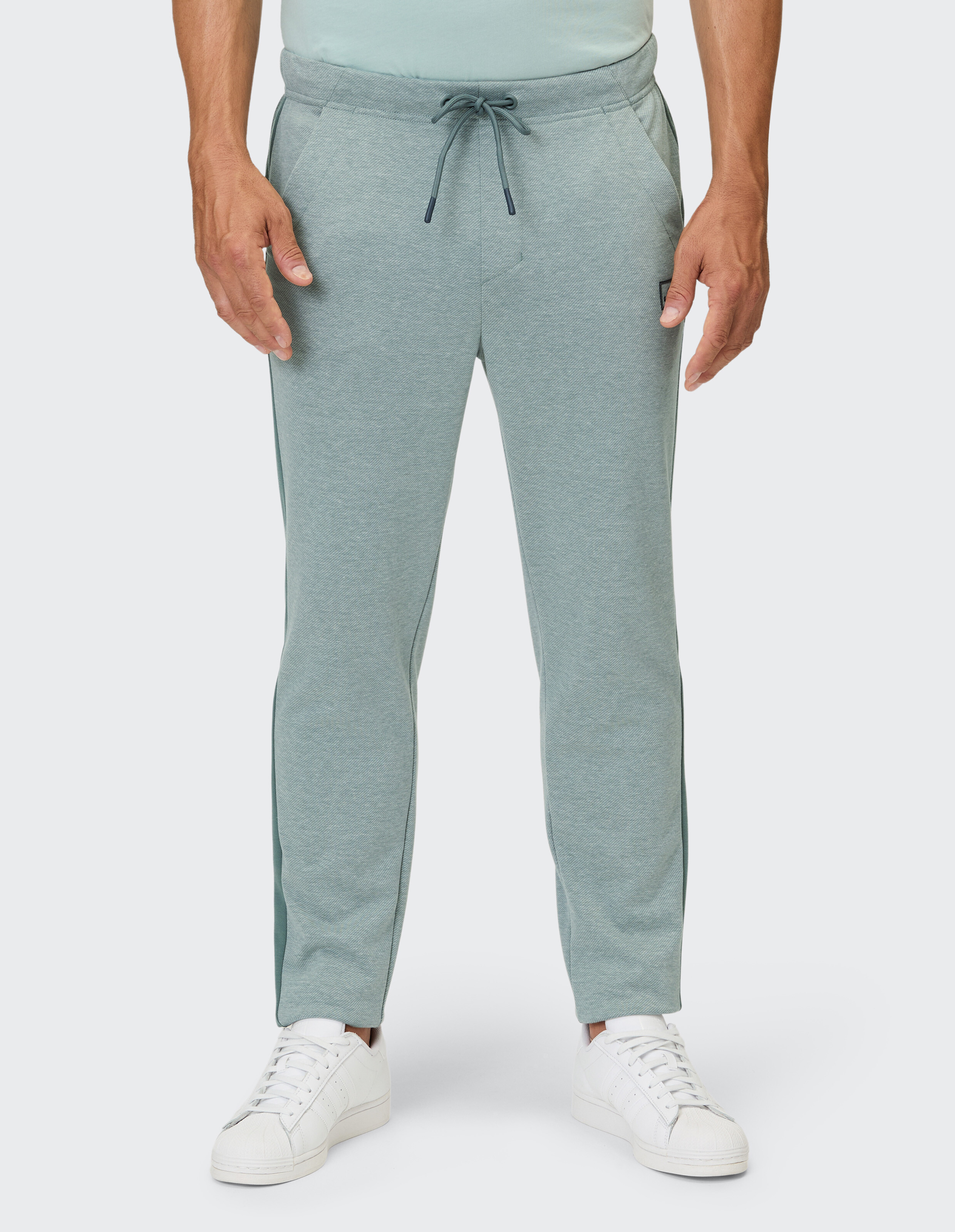 Hellgrüne Herren-Jogginghose mit Kordelzug, perfekt für den Freizeitgebrauch.