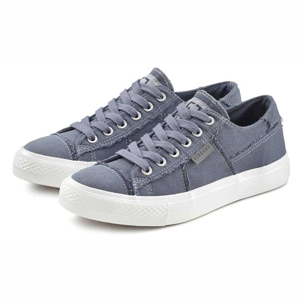 Lässige graue Canvas-Sneaker mit weißen Sohlen und Schnürdesign.