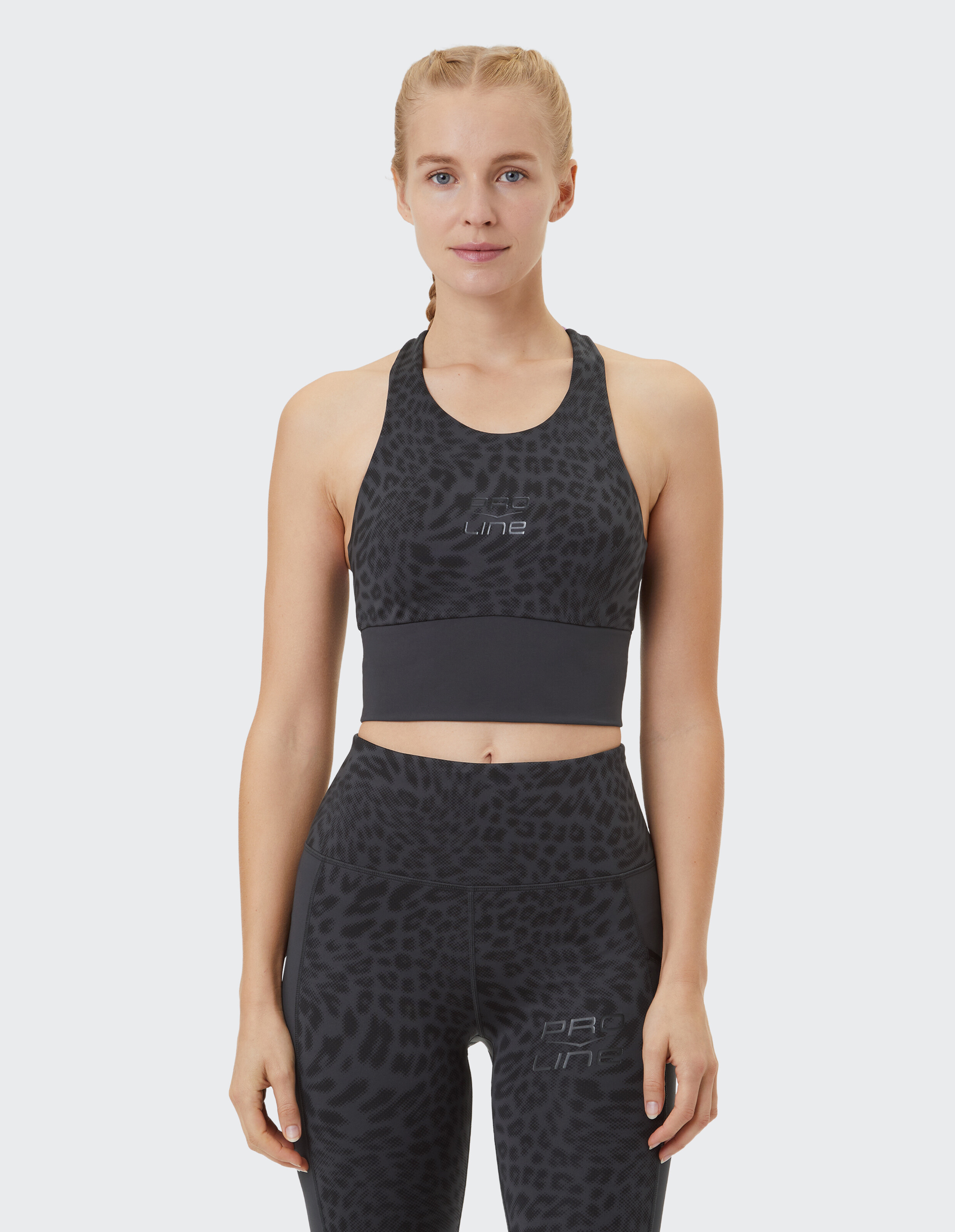 Schwarzes Sport-BH- und Leggings-Set mit Leopardenmuster für Aktivbekleidung-Enthusiasten.
