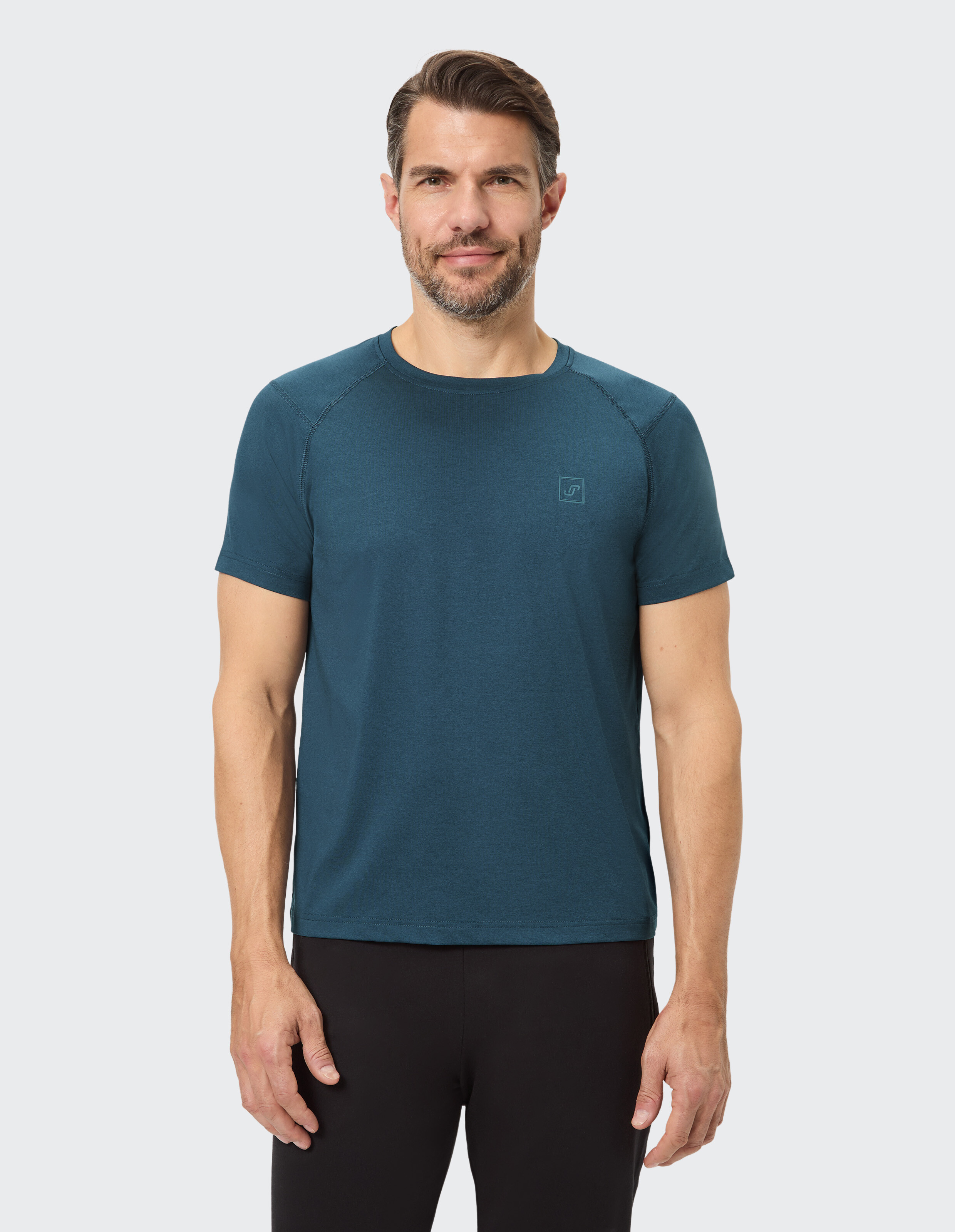 Lässiges blaugrünes Herren-T-Shirt mit kurzen Ärmeln und entspannter Passform.
