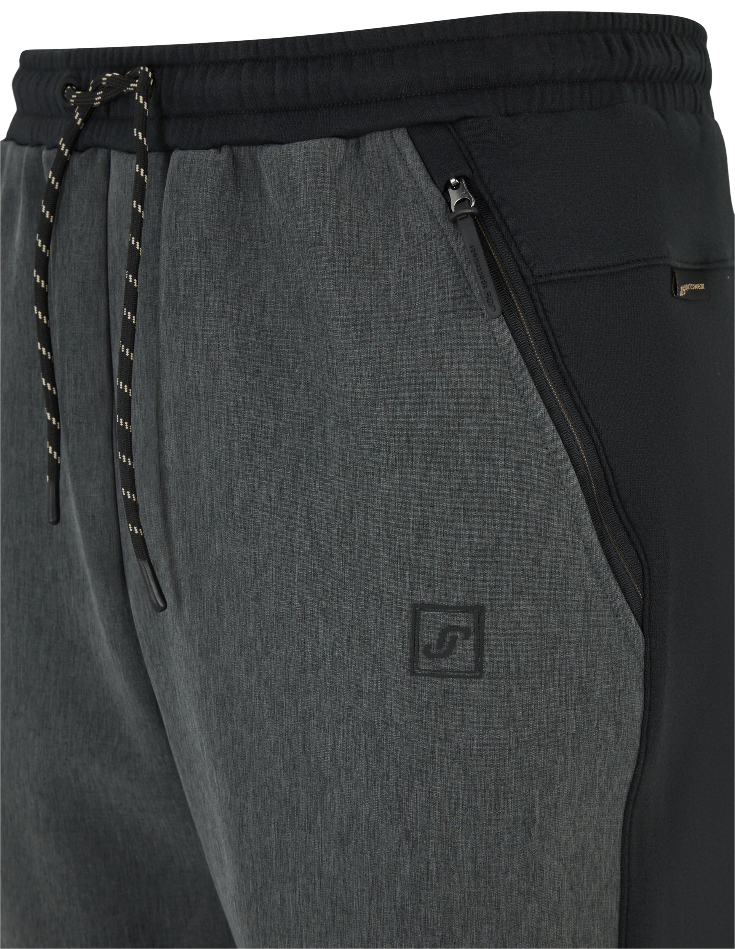 Nahaufnahme einer stilvollen grauen Jogginghose mit Reißverschlusstaschen und Kordelzug an der Taille.