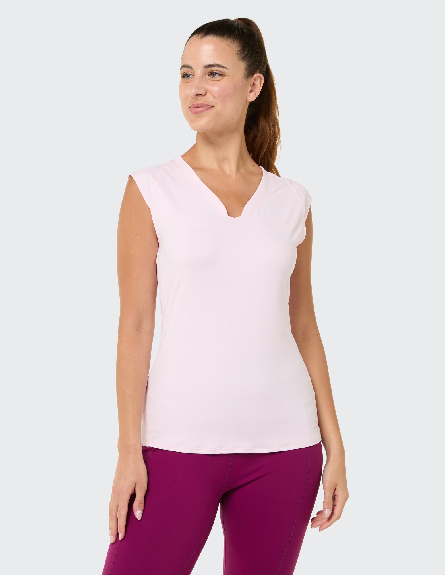 Hellrosa ärmelloses Top mit V-Ausschnitt, perfekt für den Freizeitlook.